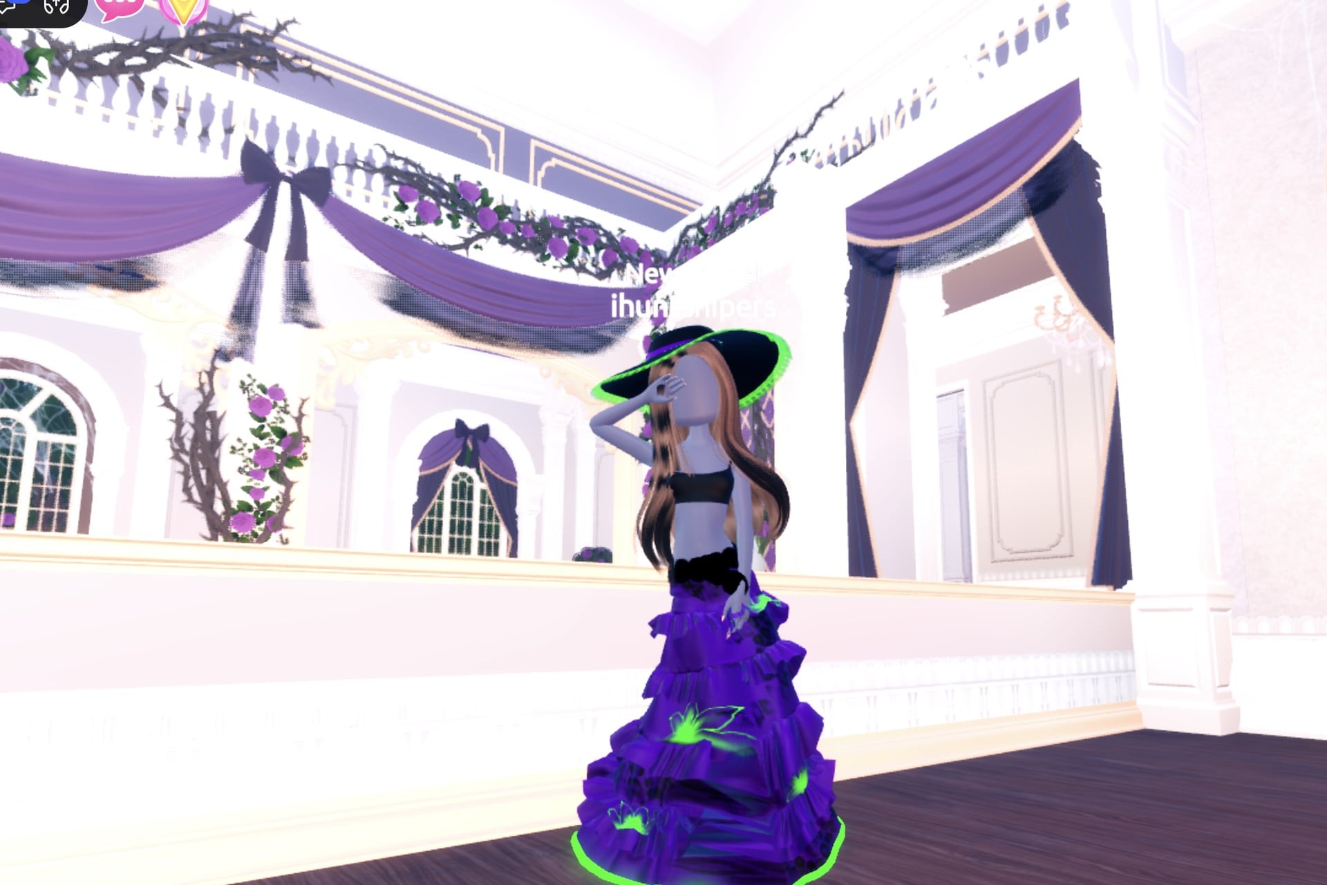 Witch brewer look on the Freeplay Runway: deep purple ruffled gown with glowing green hem and flower details, black wide hat with glowing green edge