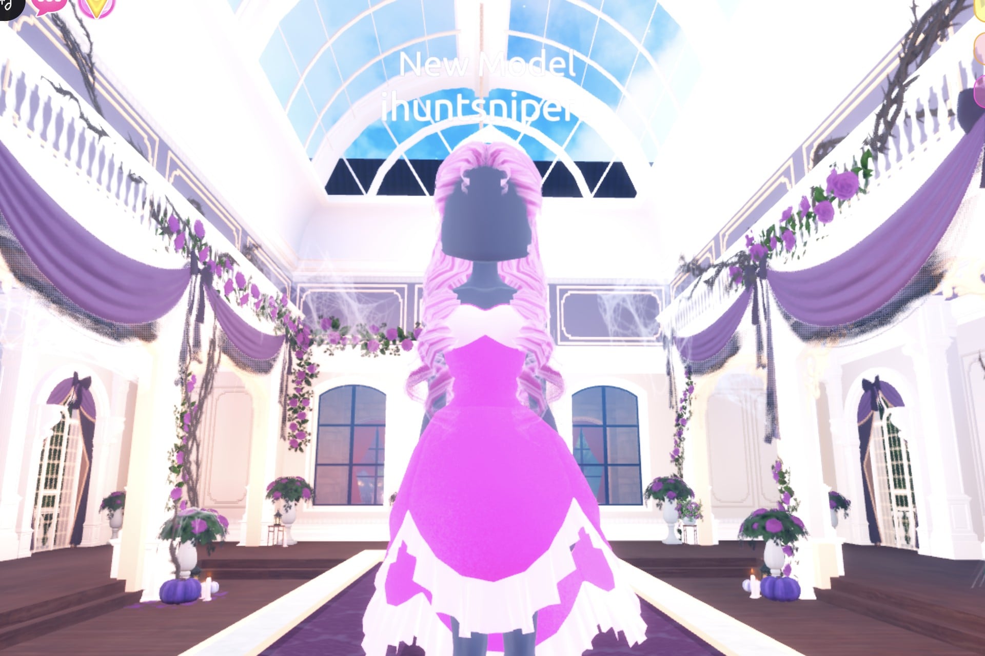 Hot pink Sweet 16 look on the Freeplay Runway: long pastel pink curls, hot pink glitter mini dress with a pale ruffle hem, pink heels