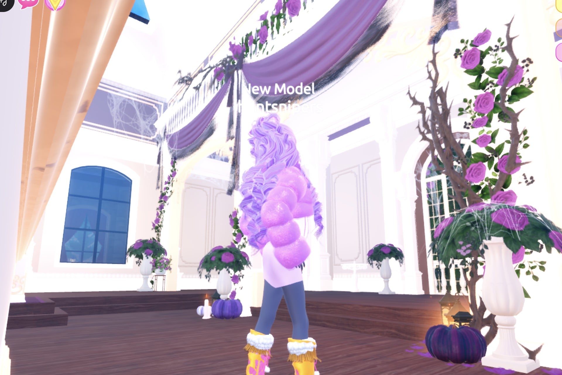 The lilac look from behind: lilac curls over the puffy lilac fur jacket, pink heeled boots