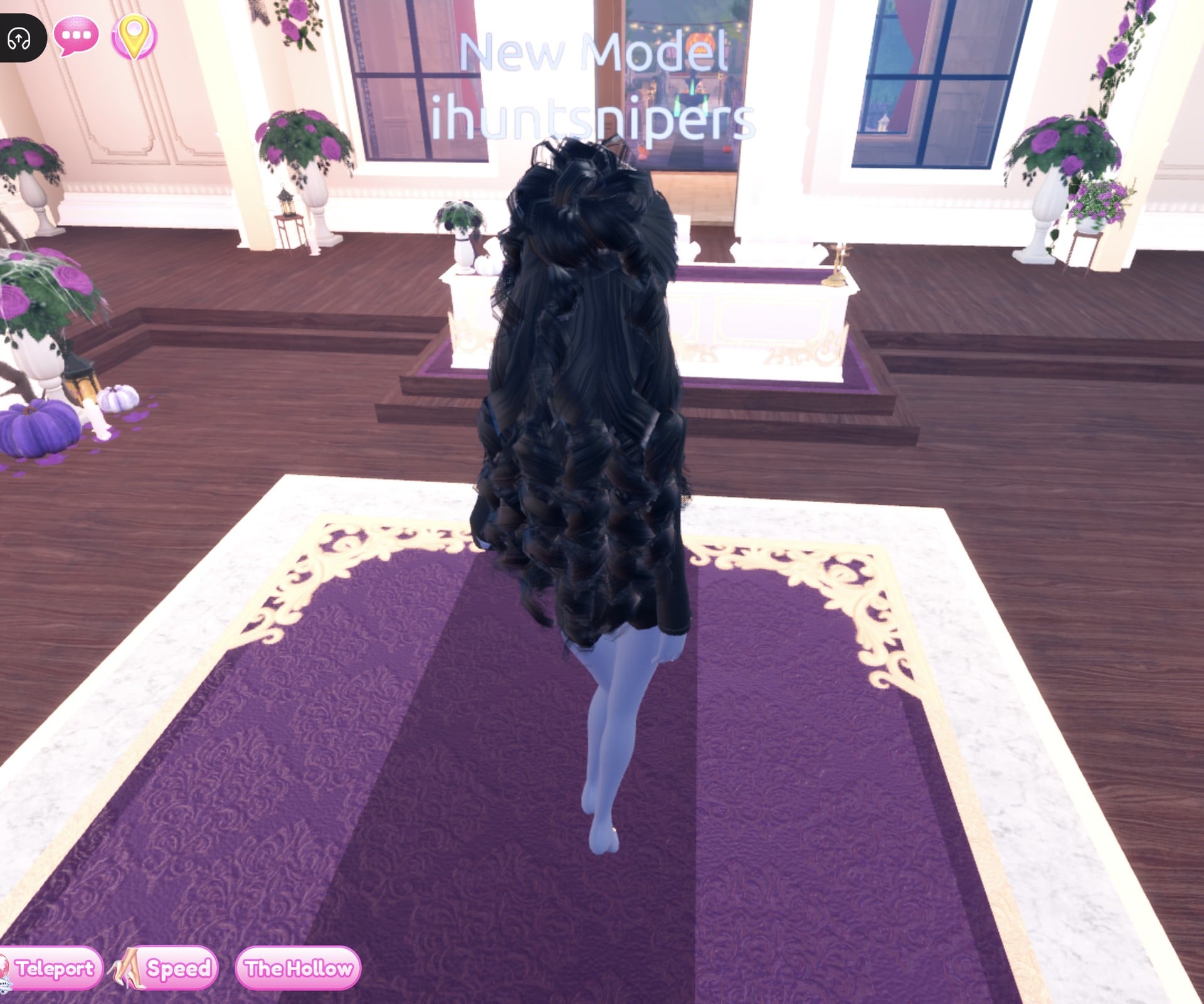 Black look from behind on the Freeplay Runway, long glossy black curls down the back