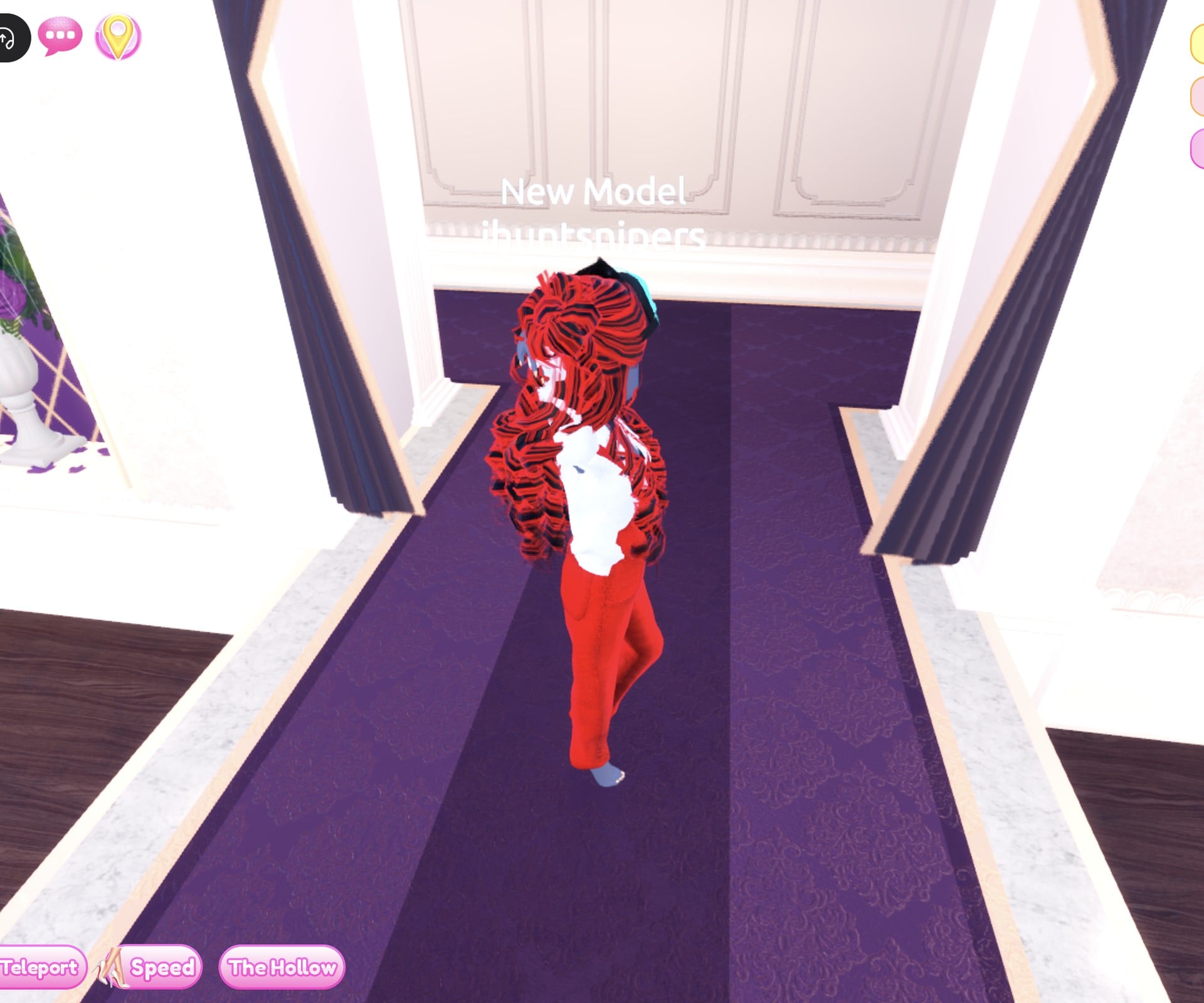 Racer look from the back, red and black curls over the white jacket and red overalls