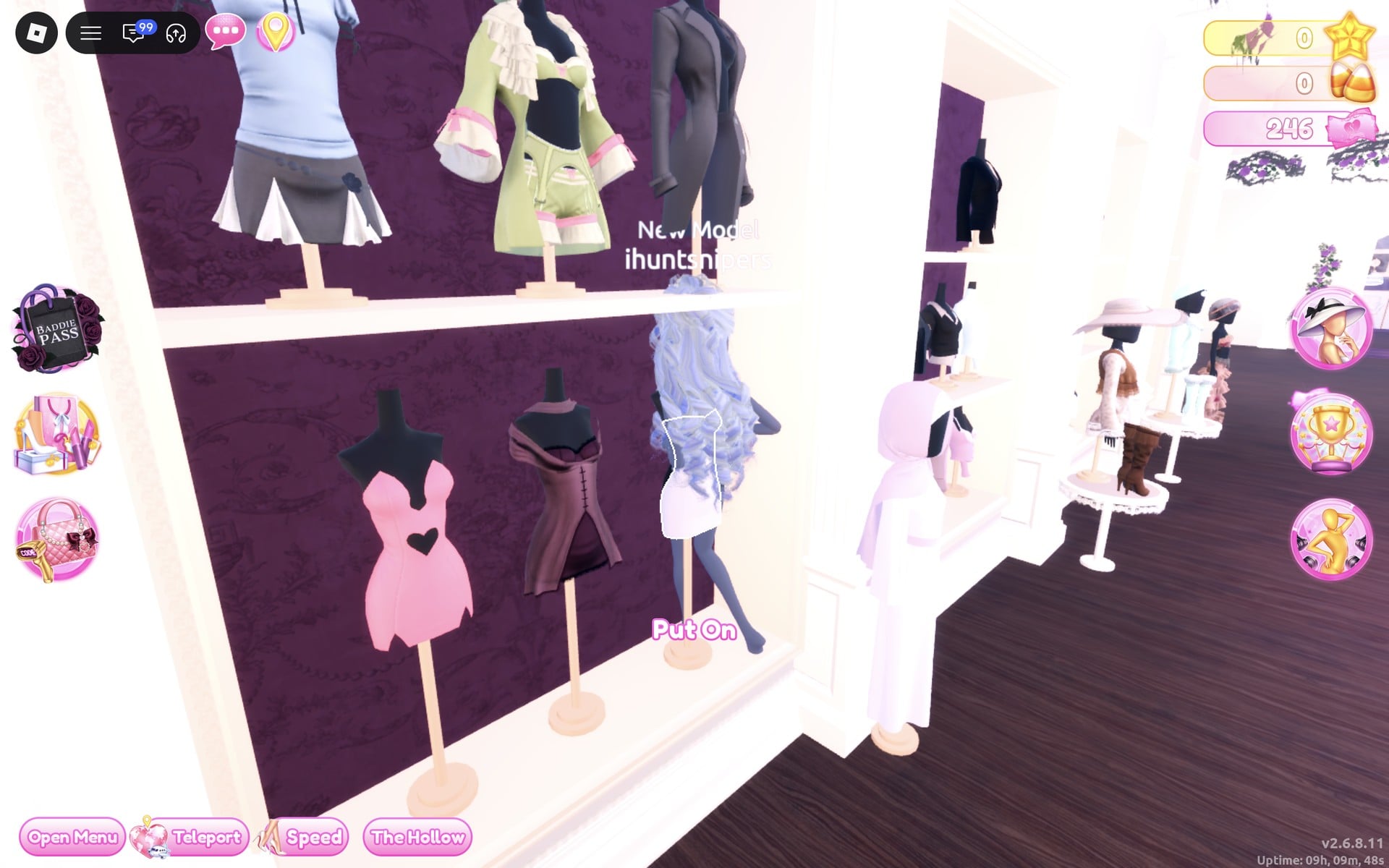 Short-dress shelf with two rows of dress forms on a purple wall: a pale blue shirt over a grey pleated mini top left, a pink heart cut-out mini bottom left