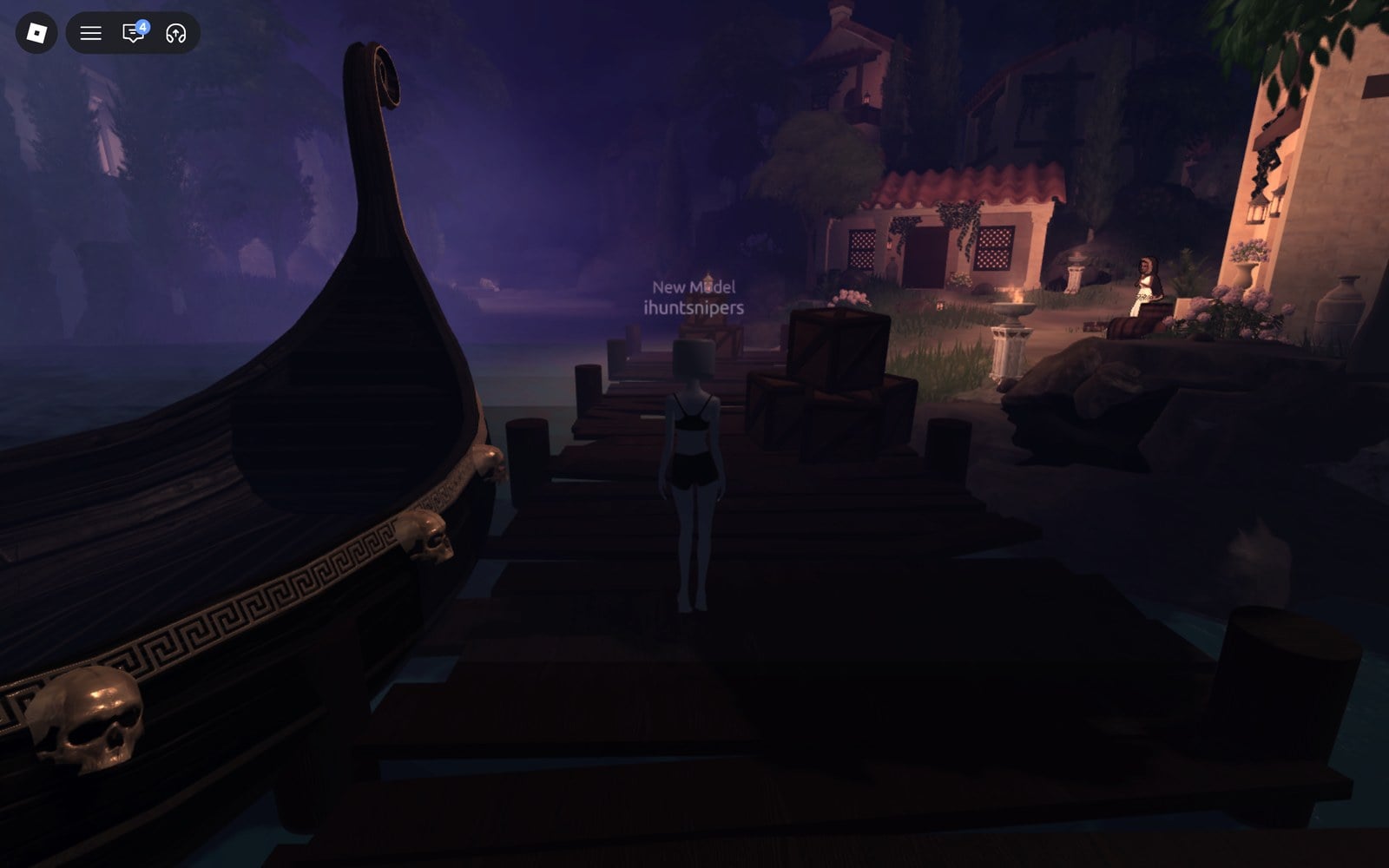 Character on a dark wooden pier beside the skull-trimmed ferry at the start of Chapter 2, village houses ahead and Atropos sitting by a house on the right