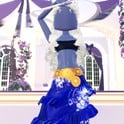 Summer Cruise look: navy Silk ruffled gown with a gold Metallic belt