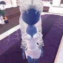 Top Model look: white Silk corset mini with dark thigh-highs, platinum curls and a silver tiara