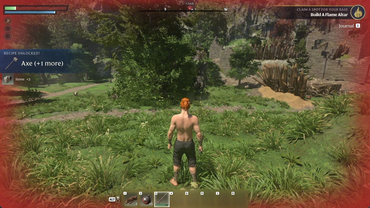 Red-haired character stands in grass near ruined walls with a recipe unlocked notice and a quest tracker, red damage vignette around the edges.