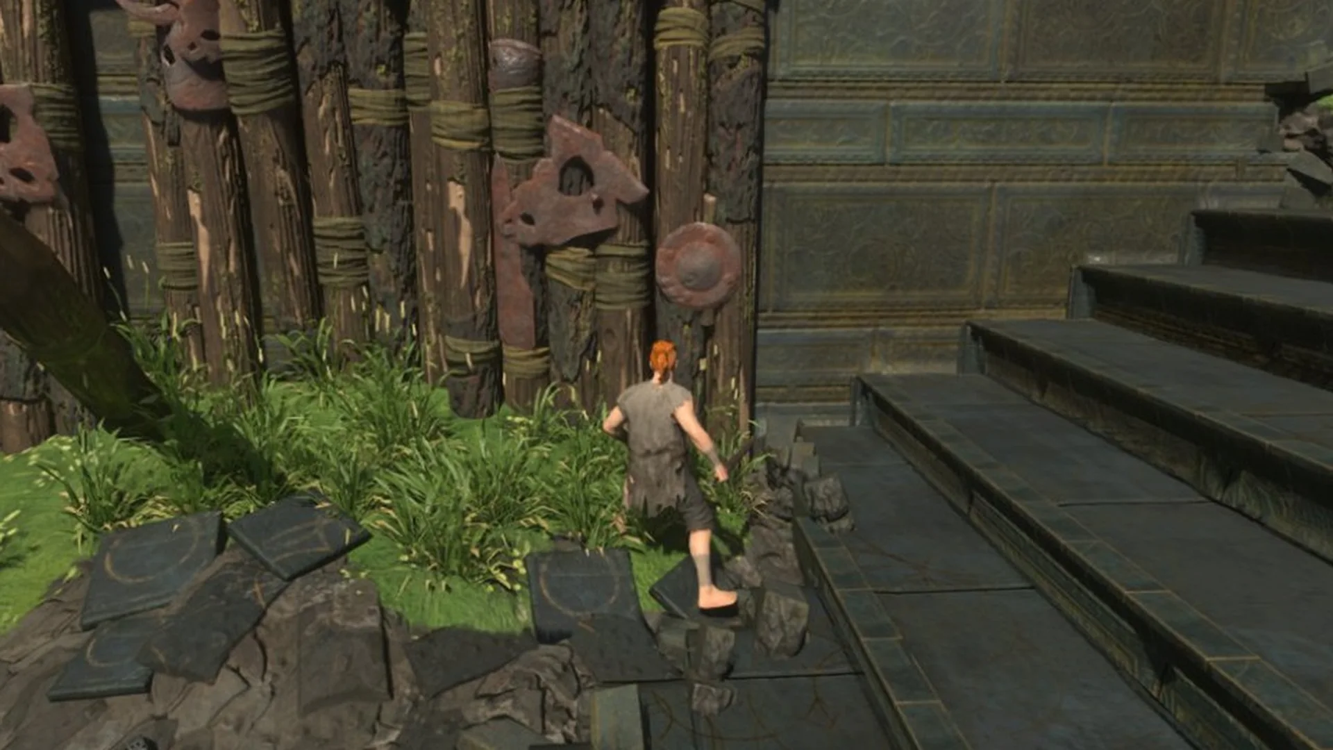Enshrouded character climbing stairs on the vault's east side beside posts with carved masks and shields