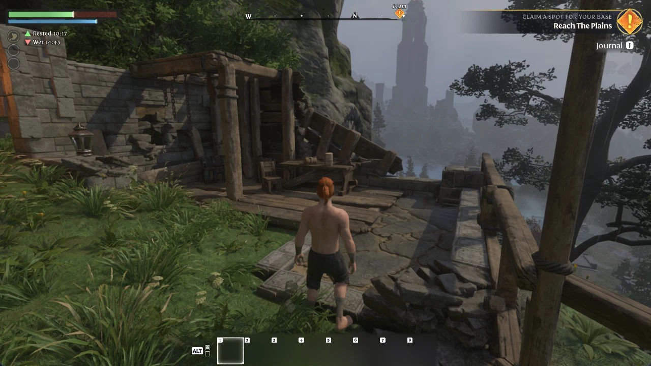 HUD showing the Reach The Plains objective while walking past ruined stone structures toward the shed