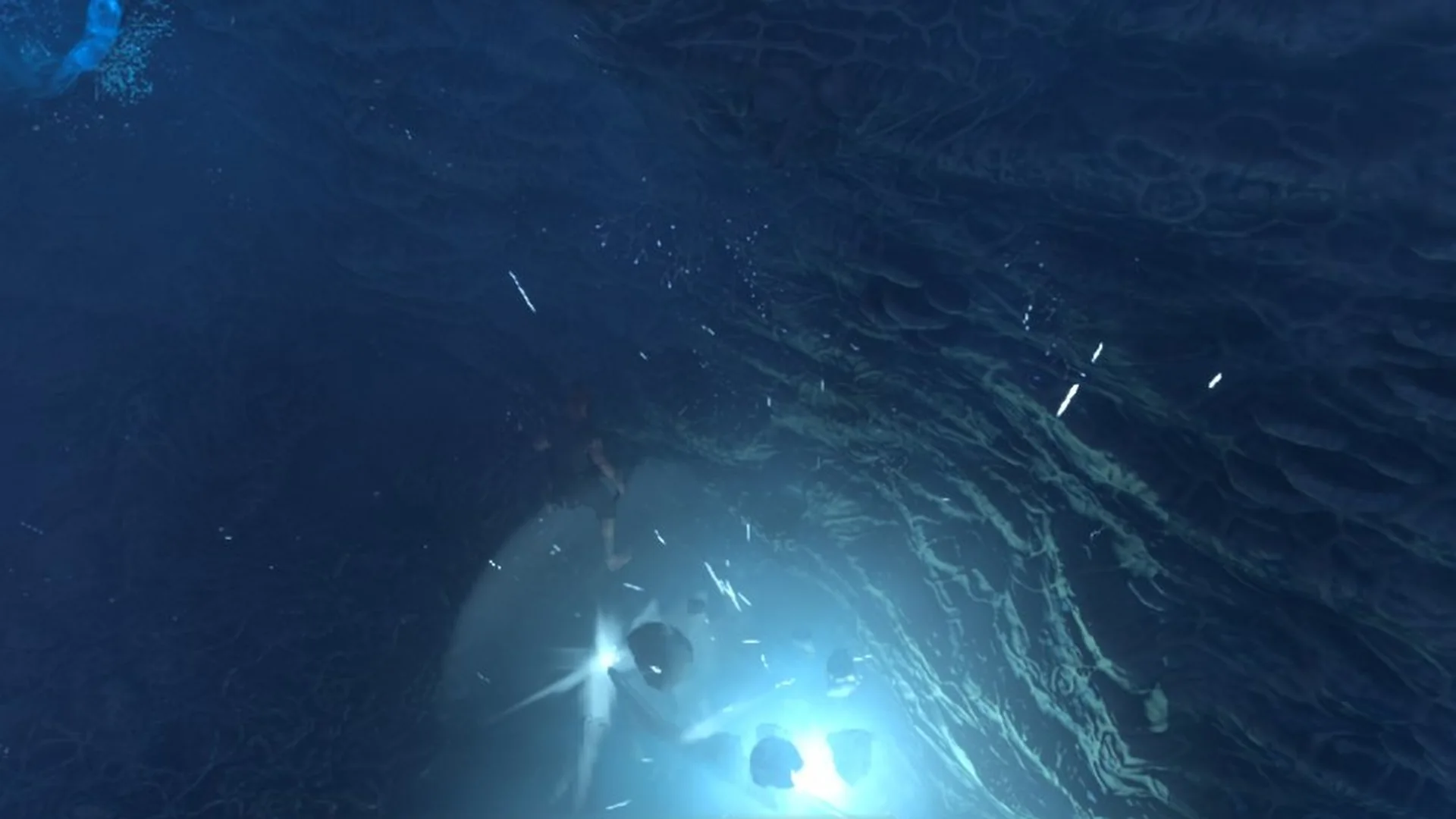 A blue explosion bursts across the cavern floor after the Fell Thunderbrute ground smash