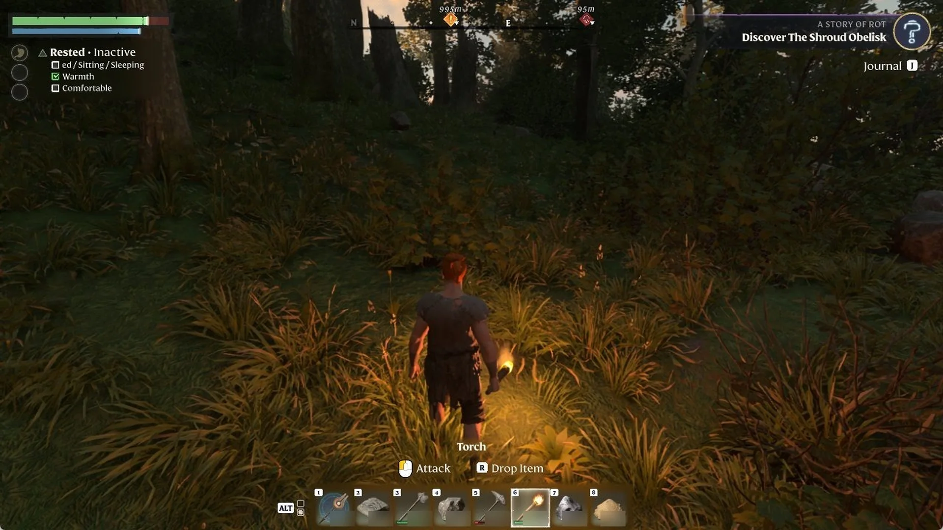 A character holds a lit Torch in a forest at dusk while the HUD shows Torch, Attack and R Drop Item