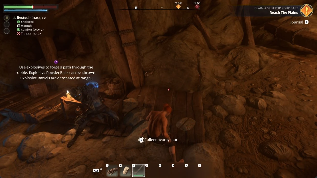 Player crouches on wooden planks in a rocky mine as an enemy sits near a table and a loot prompt shows.