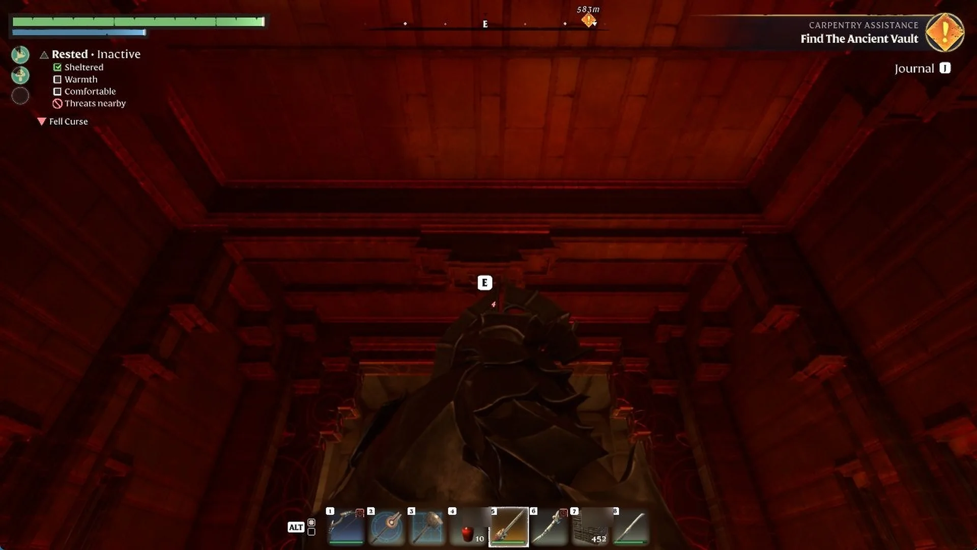 Looking up at the vault ceiling above the lava pit with the E prompt on a grapple point