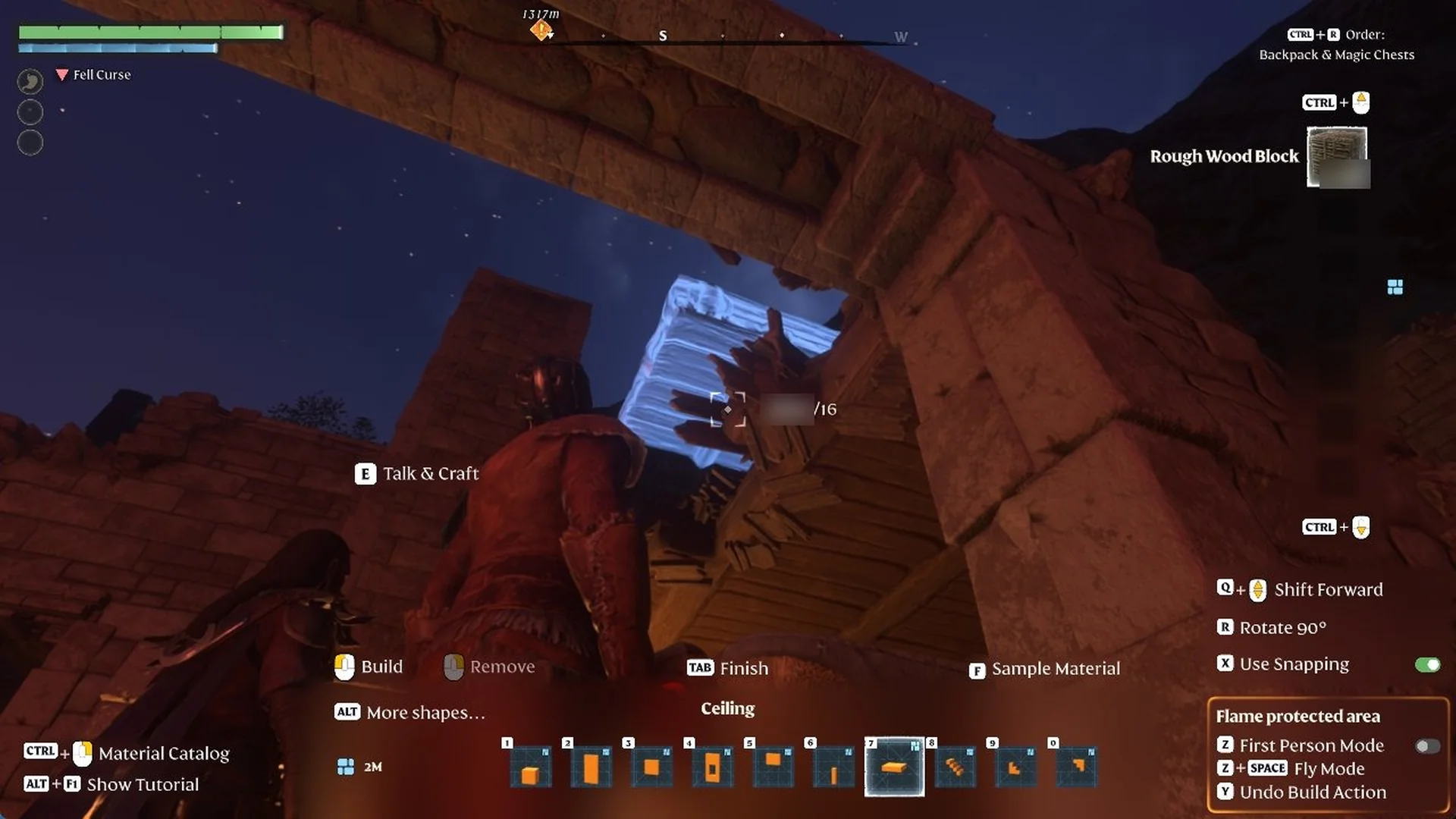 Building Mode Ceiling preview in blue filling a hole in a ruined wooden roof at night