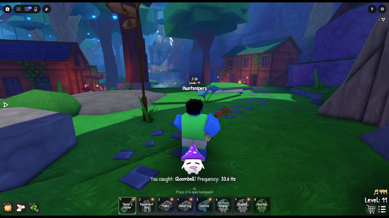 You caught: Gloombell! message showing a 33.6 Hz frequency in the Songkeeper's Grove village