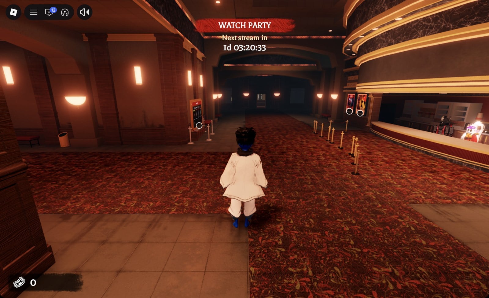 The Hollow cinema lobby: concessions counter on the right and the long carpet hall straight ahead