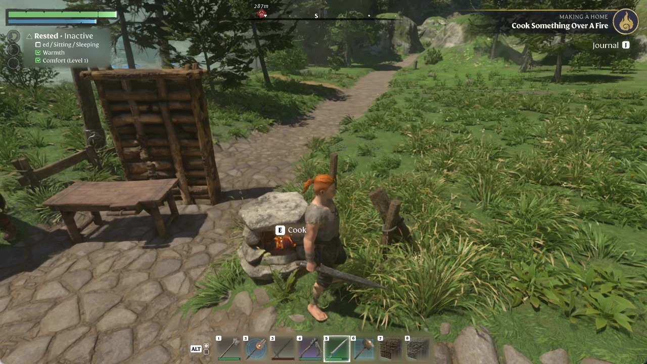 Character next to a stone fire with the E Cook prompt and the Cook Something Over A Fire objective tracked