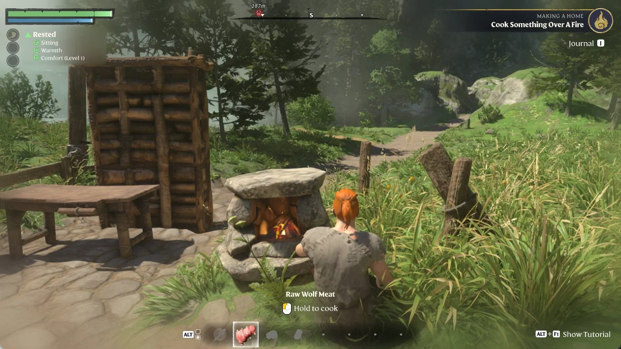 Raw Wolf Meat selected on the action bar at the fire with the Hold to cook prompt above it