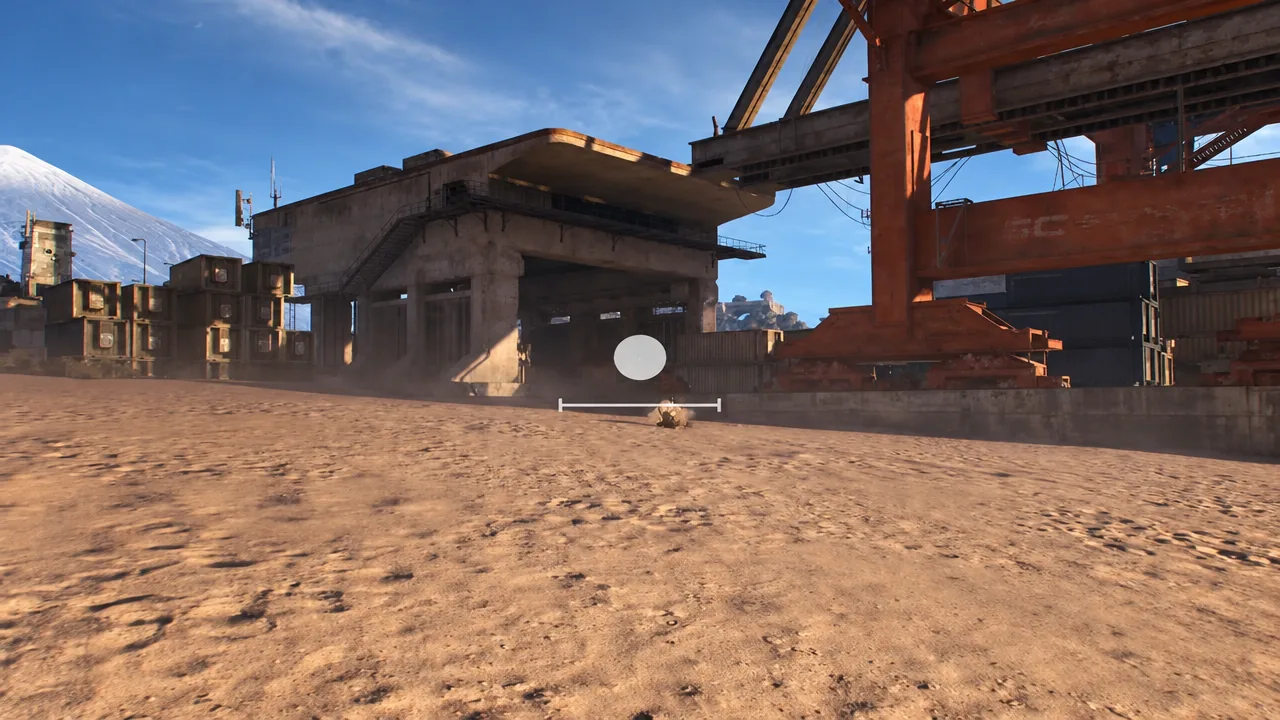 A white targeting marker hovers over a distant figure while aiming the camera