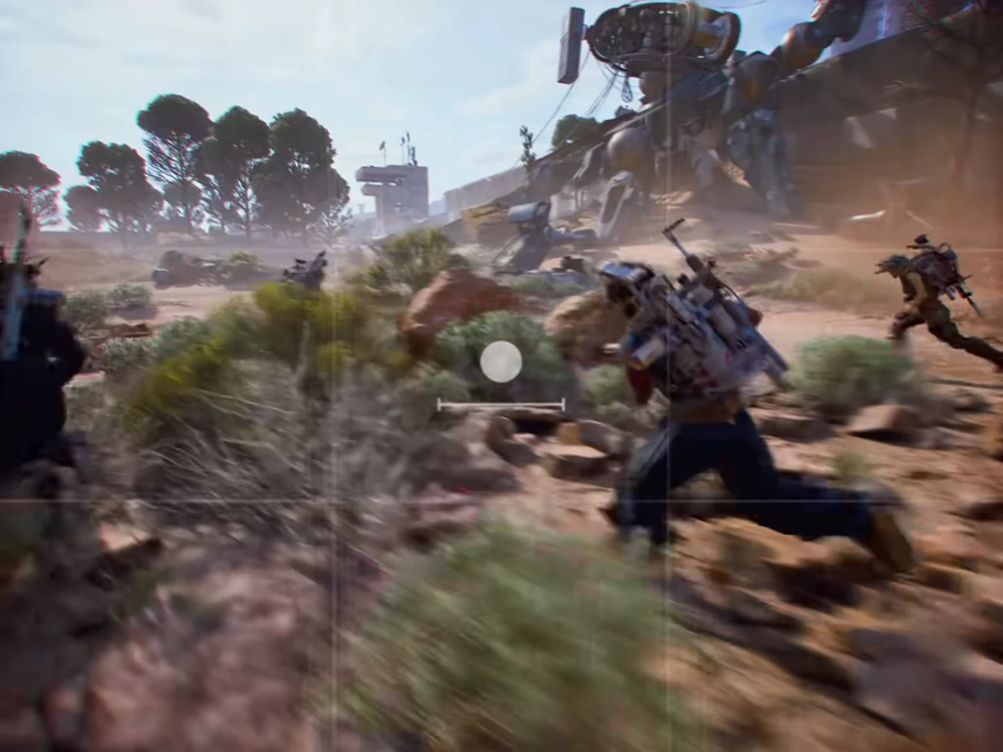 Player sprinting across a rocky battlefield with the central aiming reticle visible