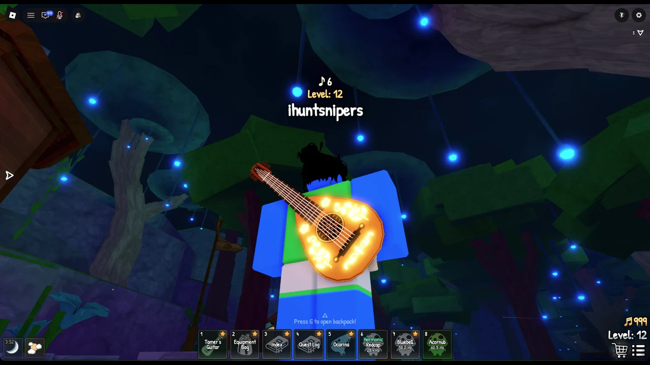 Forest view with the Tamer's Guitar equipped and the Press G to open backpack prompt on screen