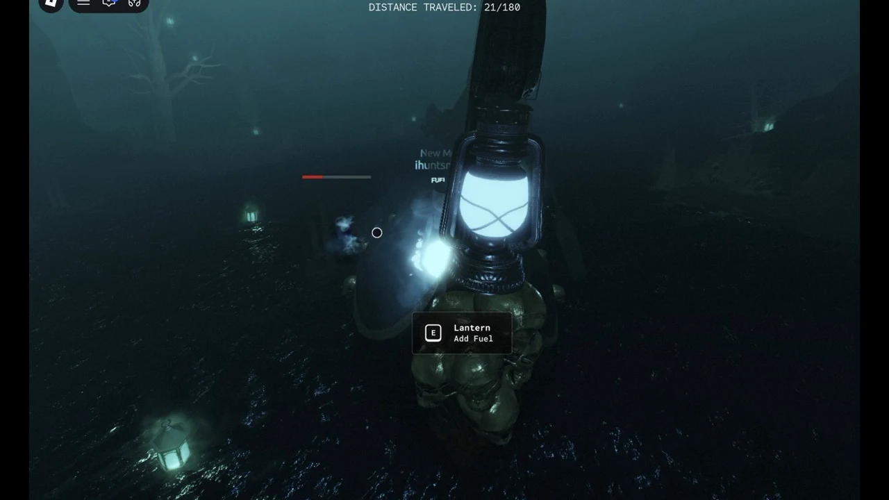 Lantern on its pole above the skull pile with the E Lantern Add Fuel prompt on screen