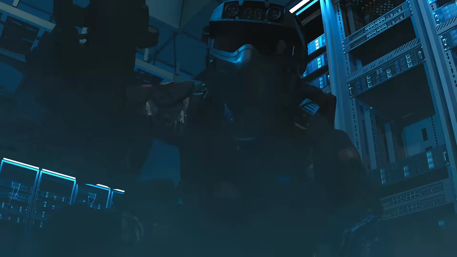 Helmeted operative next to glowing server racks in a dark, blue-lit control room