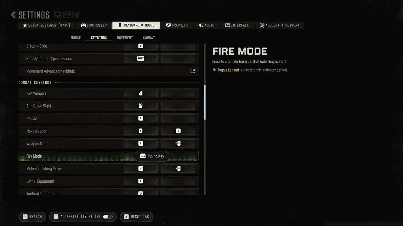 Keybinds list with the Fire Mode binding selected and the Delete prompt to unbind the key shown