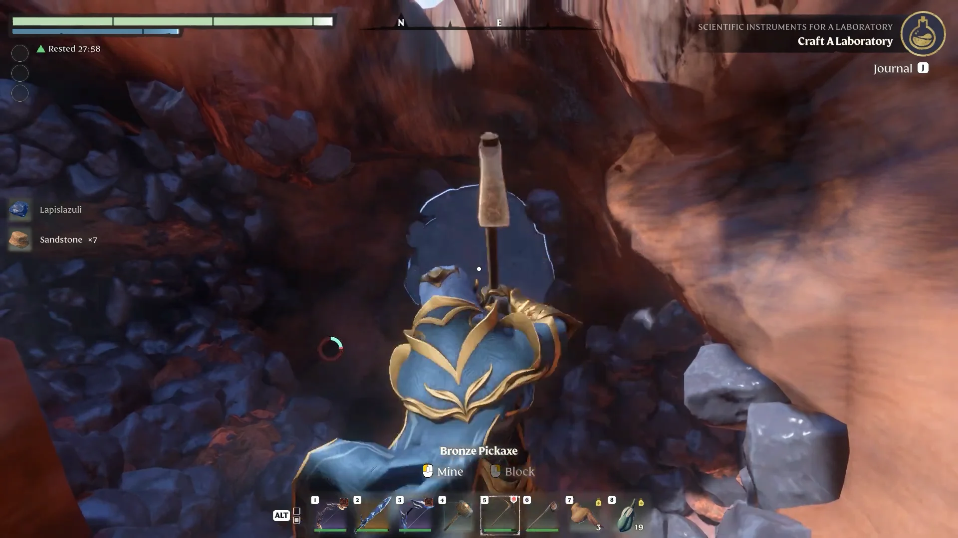 mining a blue deposit in a red rock wall, pickup Lapislazuli
