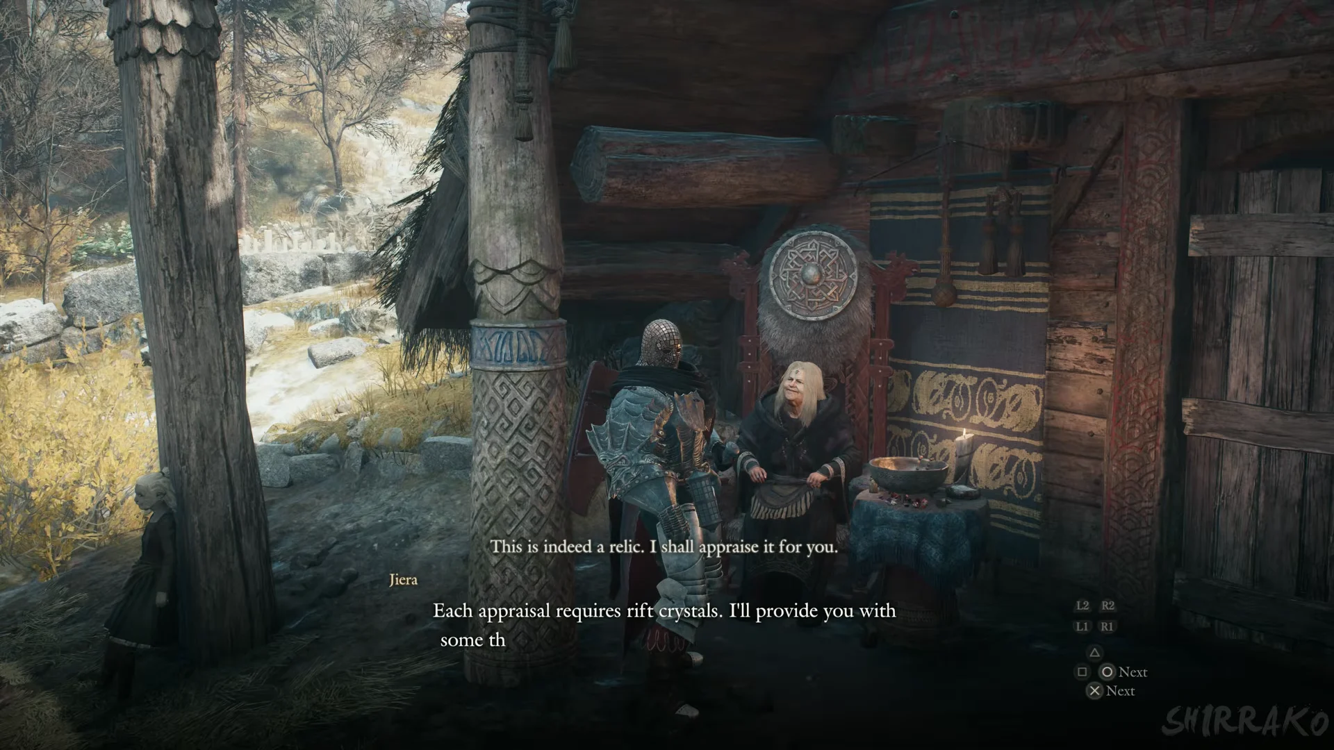 Jiera on her porch in the settlement