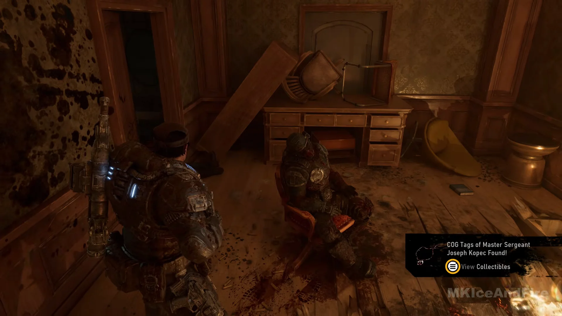 Dead Gear in the red armchair