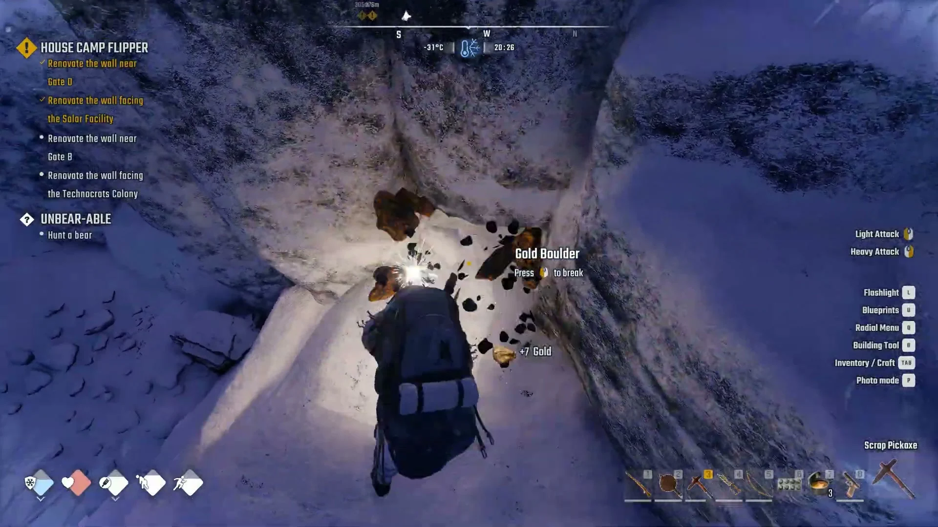 A Gold Boulder bursting into chunks in a snowy crevice with the prompt Gold Boulder, Press to break and +7 Gold, Scrap Pickaxe in hand