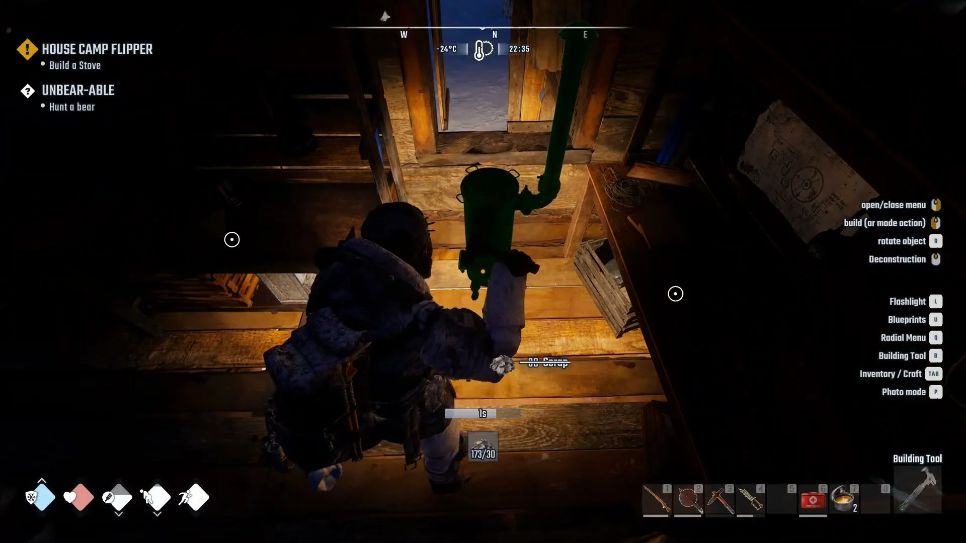 A Stove with a green pipe standing on a wooden floor just after placement, with a struck-through 30 Scrap line and the objective Build a Stove