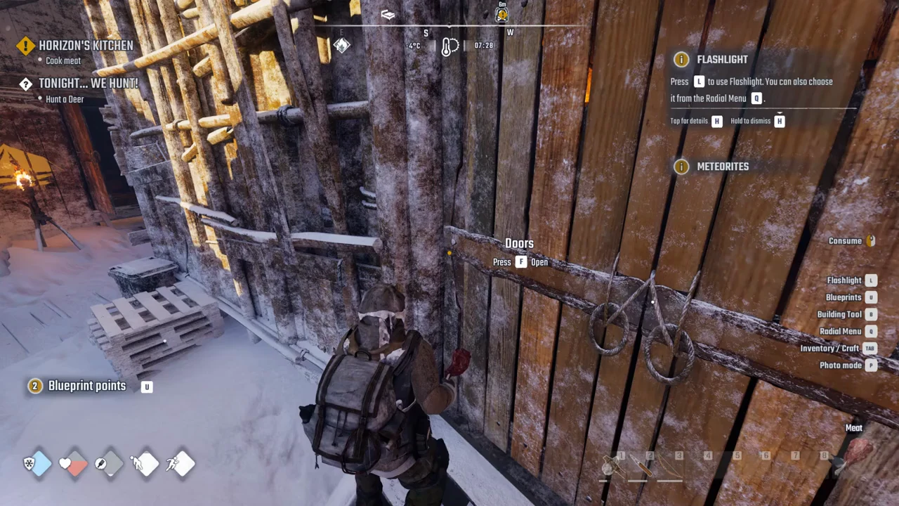The Doors prompt with Press F Open active outside the snowy kitchen building
