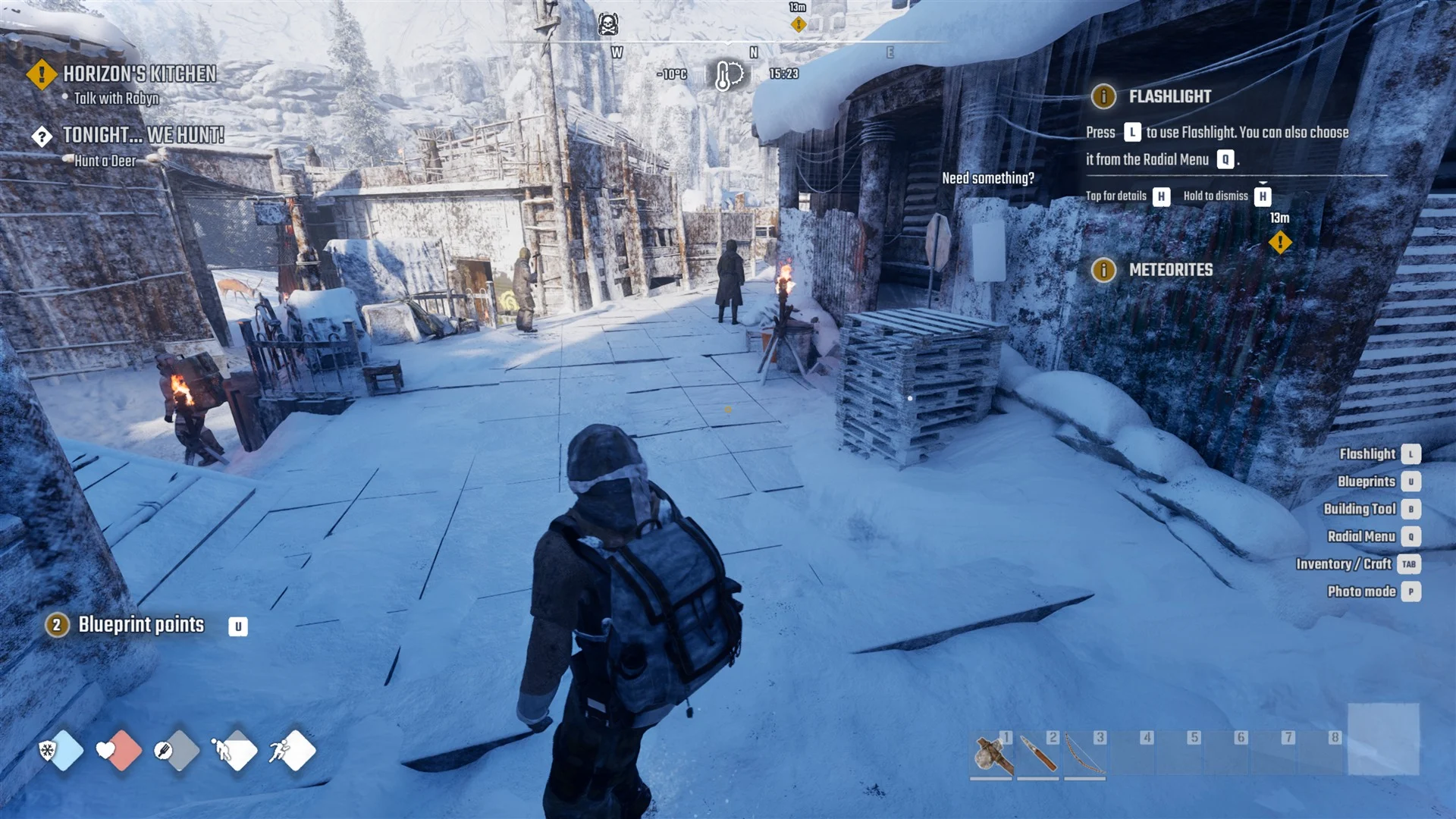 Horizon's snowy yard by day with torches, a palisade and the trader's building ahead