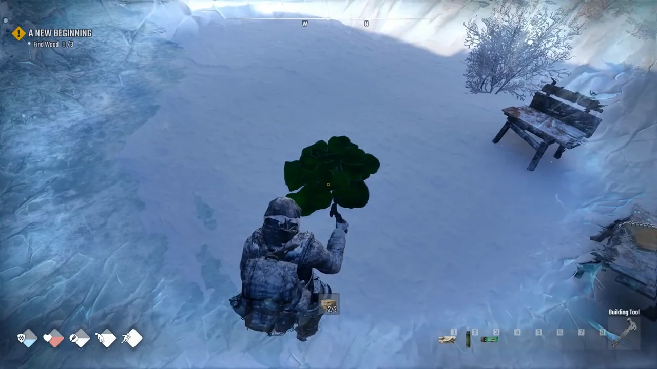 Green Campfire preview on open snow beside a bench, with the Building Tool in hand