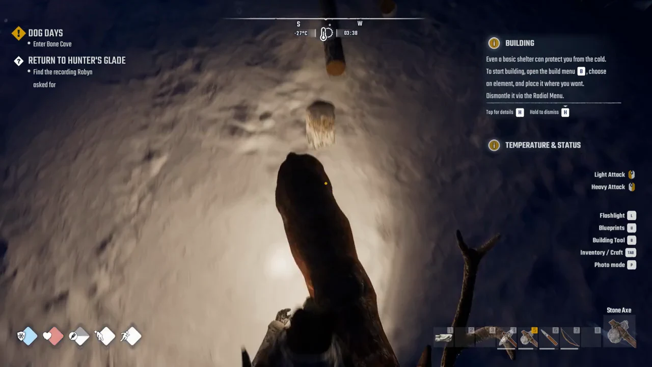 Survival HUD showing the building tutorial prompt to press B while facing a snow-covered surface