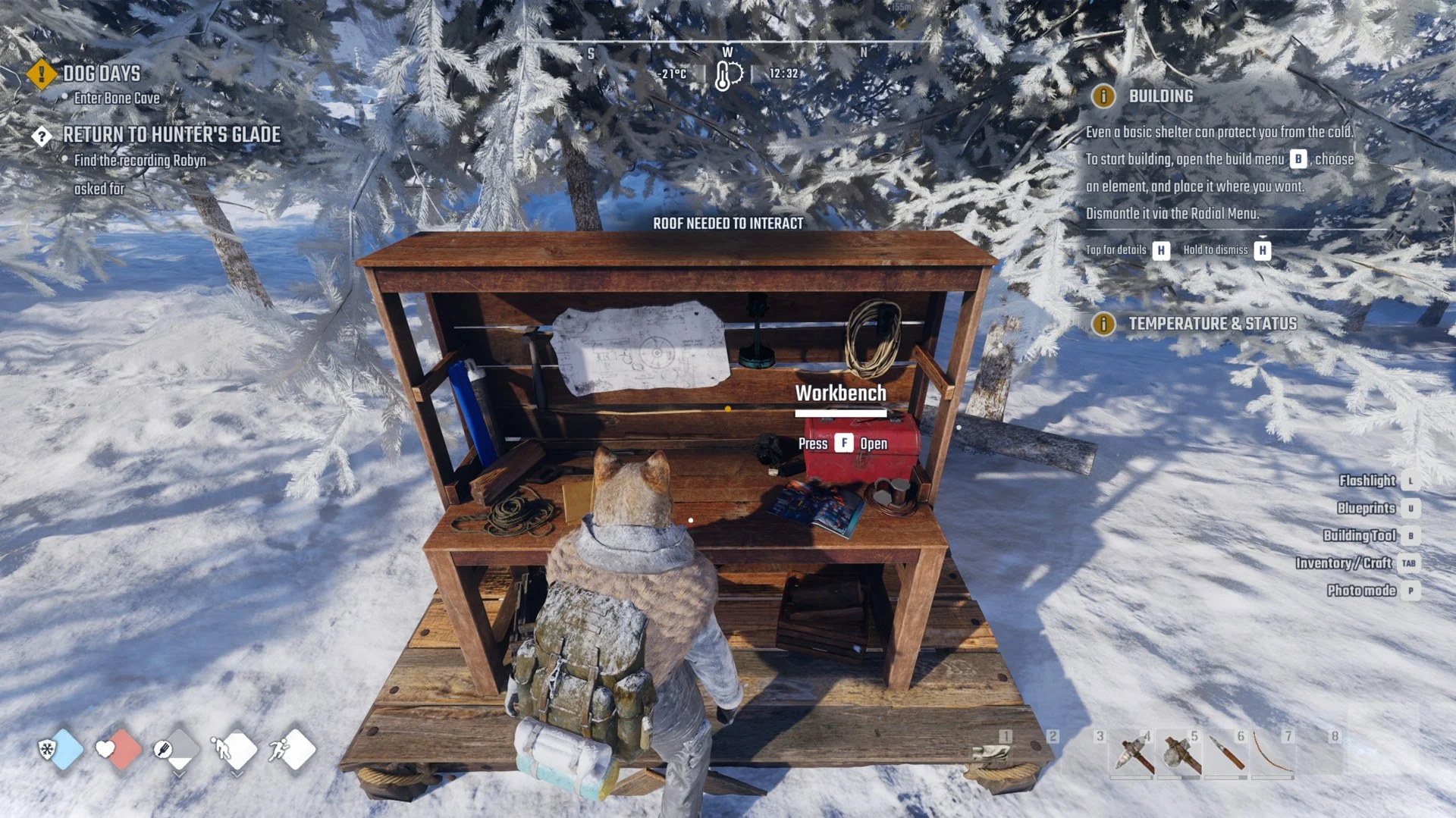Workbench on a wooden foundation in the snow with the line ROOF NEEDED TO INTERACT above the prompt Workbench, Press F Open