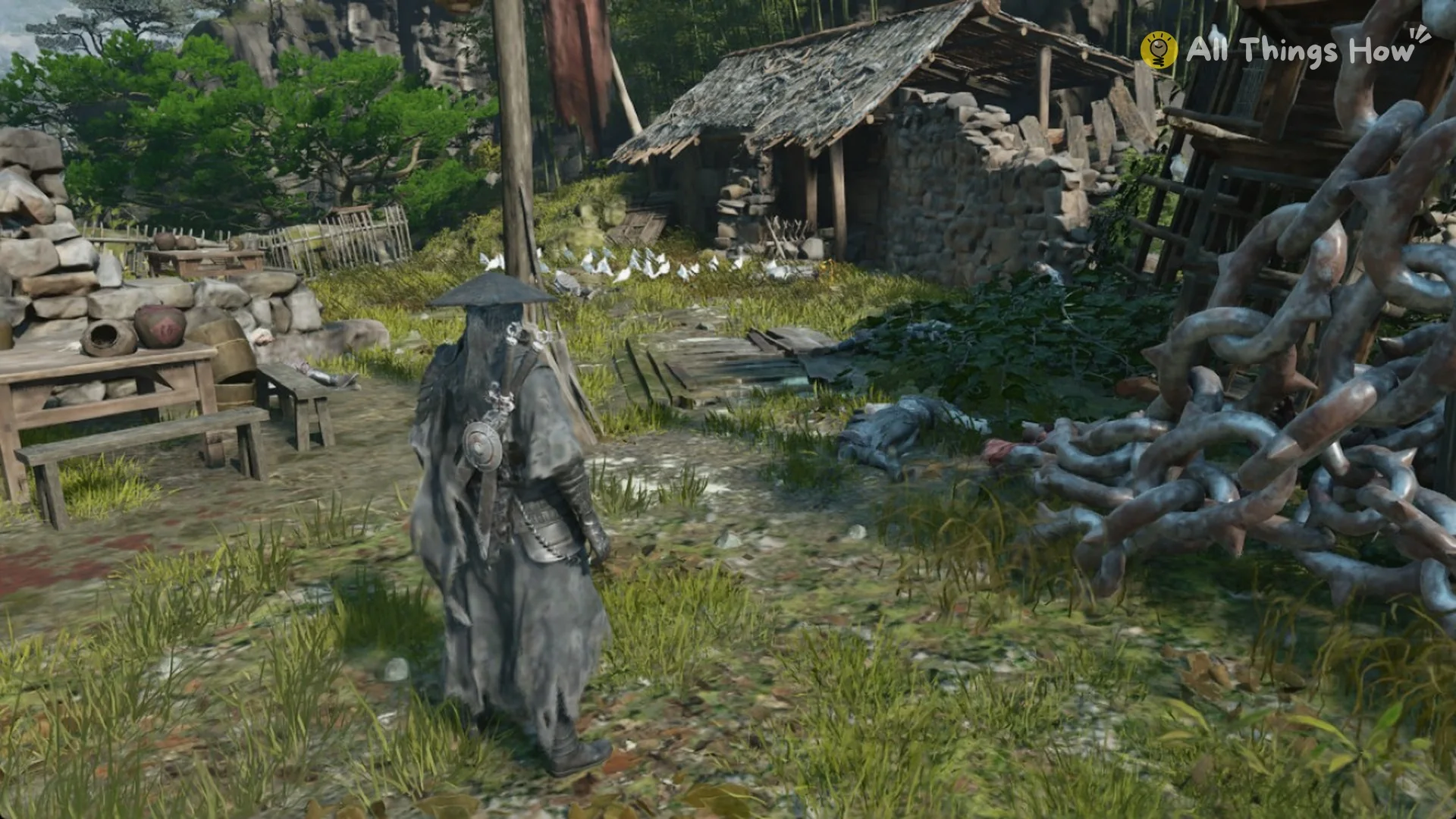 Soul walking through a village with stone walls and chains in Weeping Creek Valley, Phantom Blade Zero