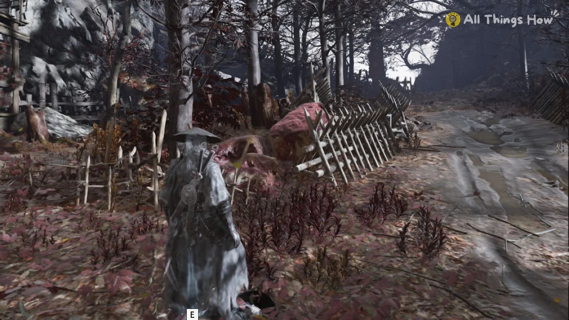 Ancient Timber pickup prompt at a roadside rubbish heap by a broken fence near the Red Serpent House bell in Phantom Blade Zero