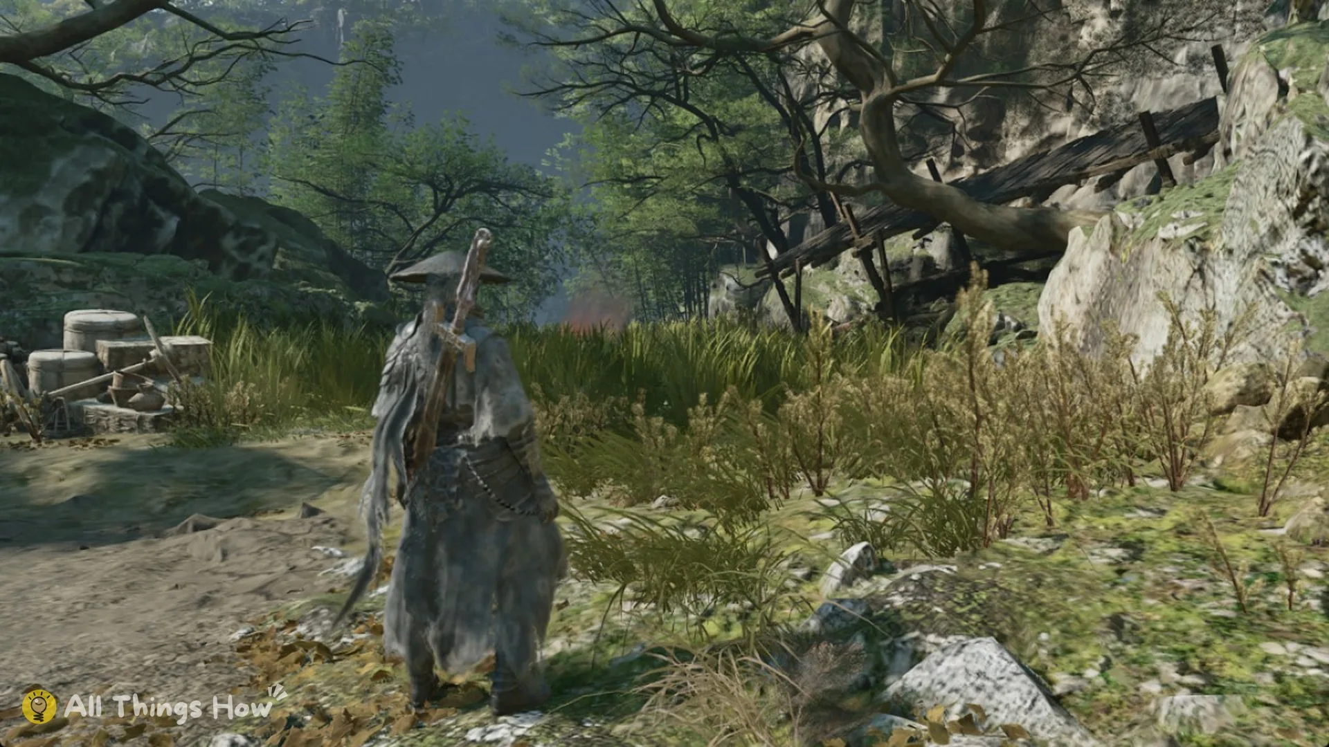 Walking toward tall grass and a campfire in Weeping Creek Valley in Phantom Blade Zero
