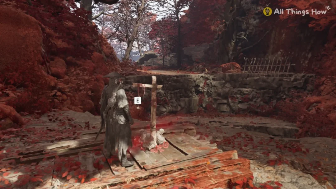 Soul at a wooden cross shrine among red trees in the Crimson Forest in Phantom Blade Zero