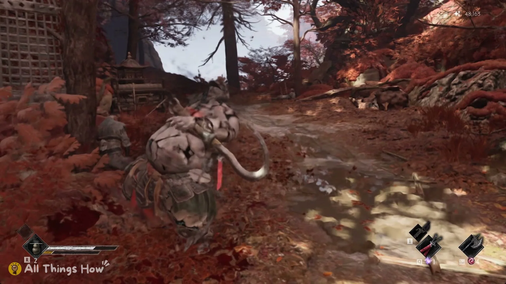 The Butcher collapsing after his health bar runs out in Phantom Blade Zero