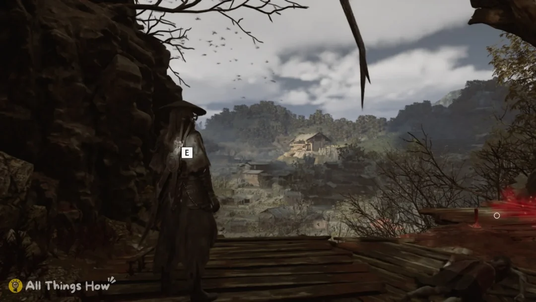 Soul on the plank floor of the Cliff of Longing looking out over the Crimson Forest village in Phantom Blade Zero