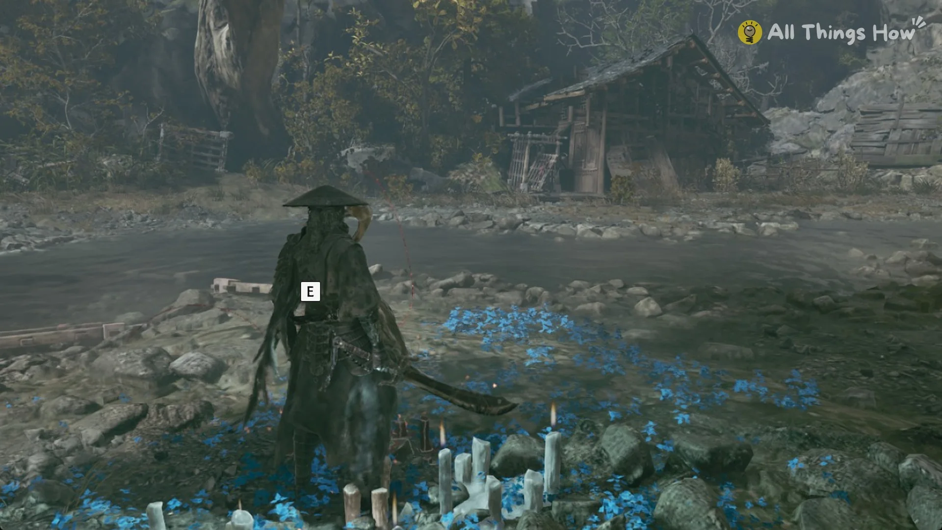 The E prompt at a Crane Bell with blue flowers and candles in Phantom Blade Zero