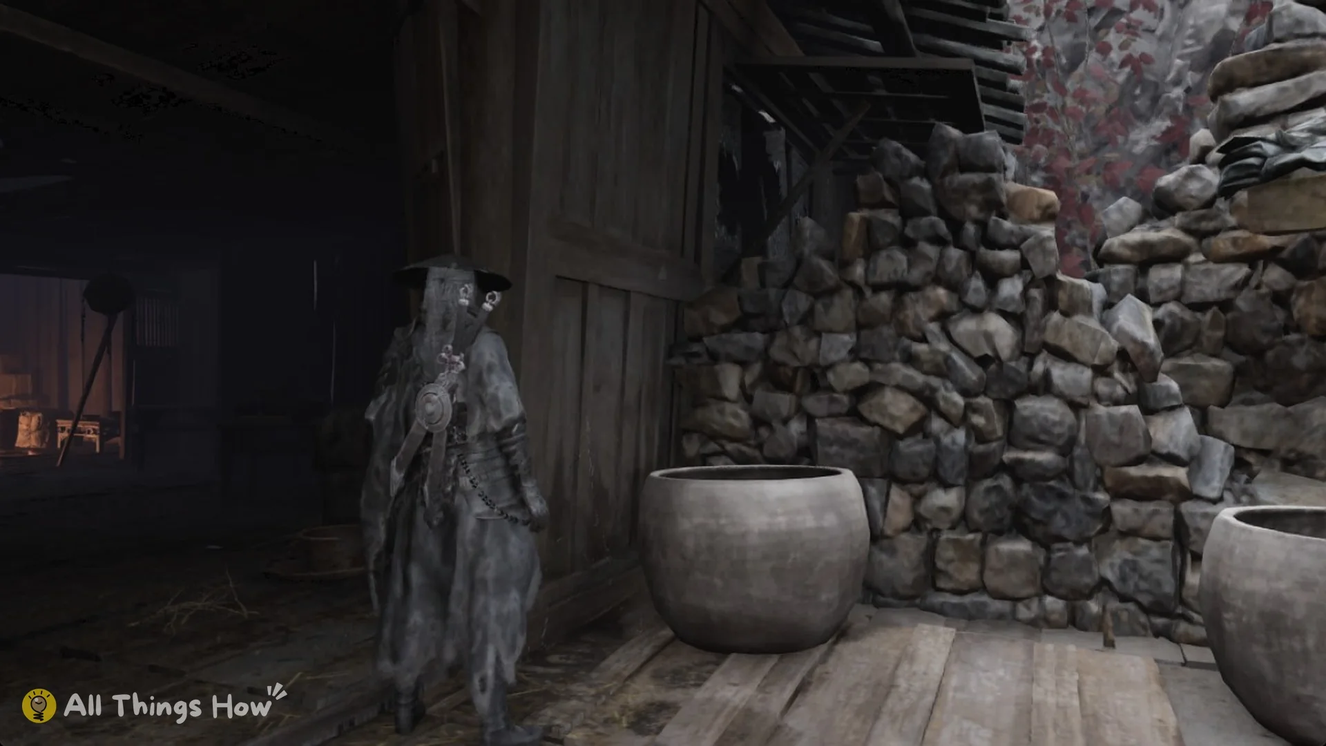 Soul on the plank landing at the top of the stairs beside the dark doorway of the key house in Phantom Blade Zero