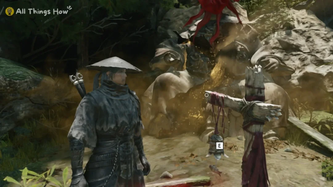 Soul in front of seated stone statues and a red-cloth scarecrow in Weeping Creek Valley, Phantom Blade Zero