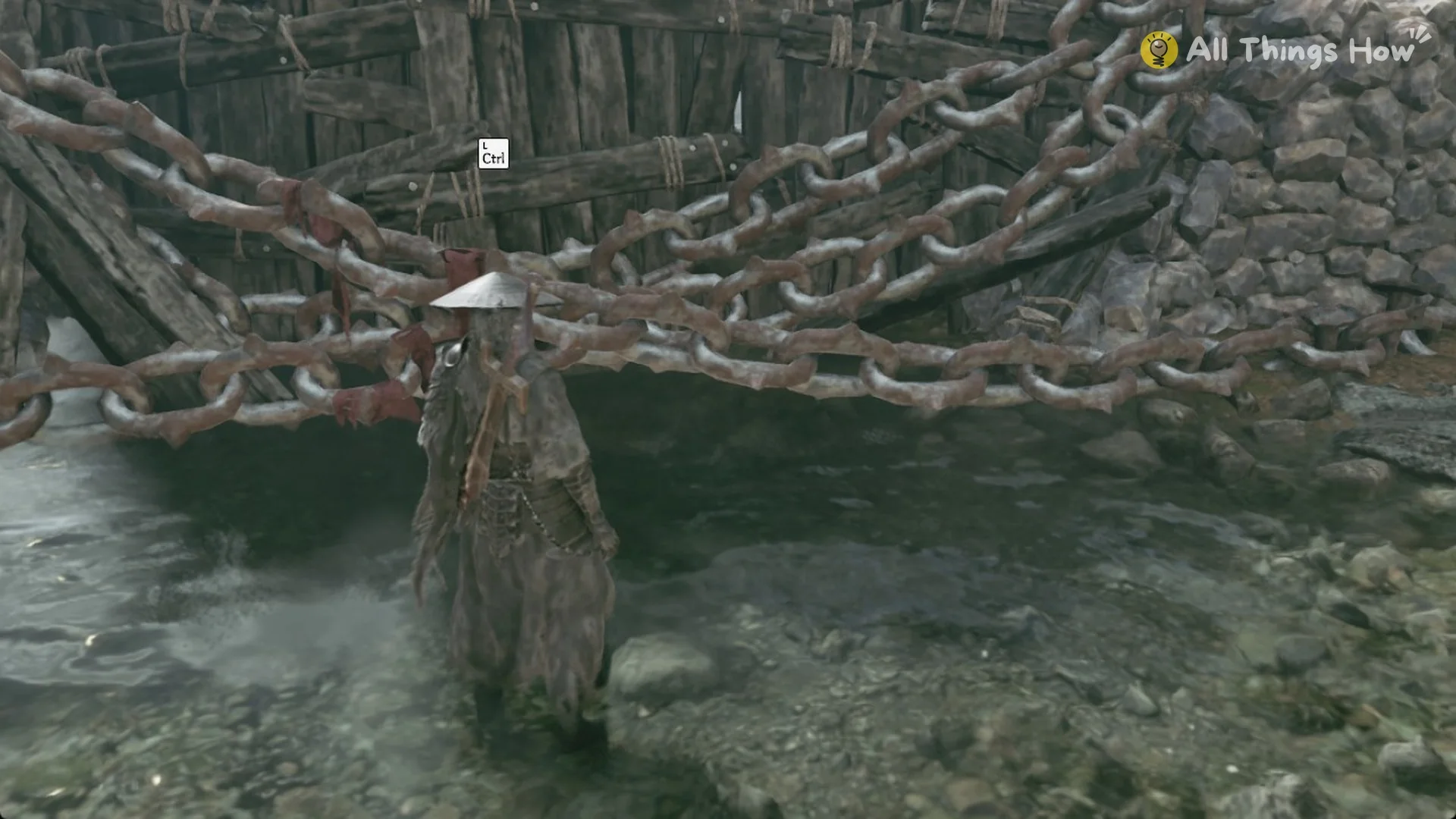 The chain wall across the river with the L Ctrl prompt in Phantom Blade Zero