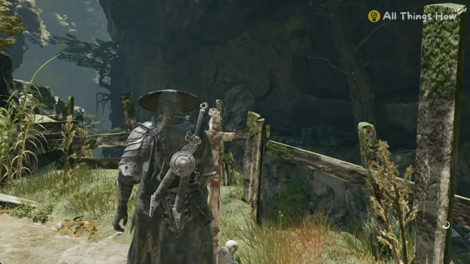 Soul walking past stone posts and a wooden fence in Weeping Creek Valley, Phantom Blade Zero