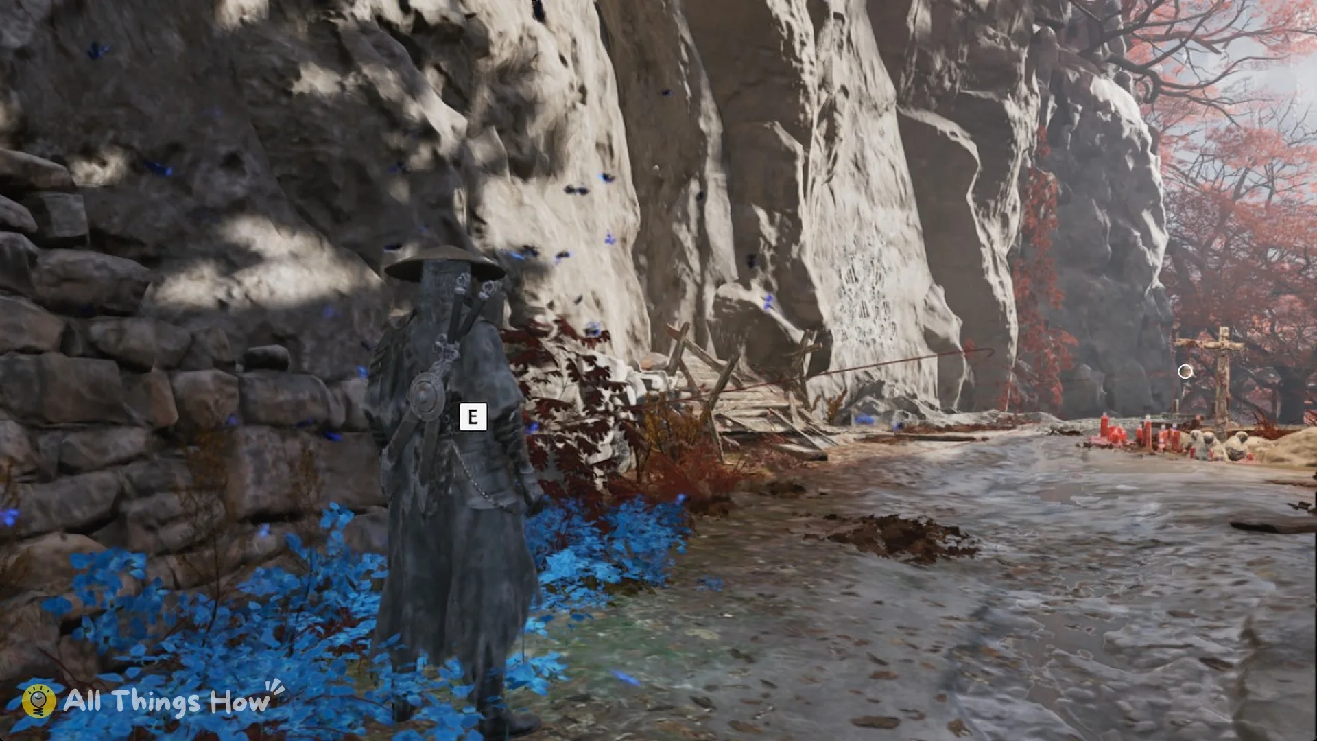 Soul in the blue Memory Flower patch by a dry-stone wall near the Mirrorwood Entrance bell, Phantom Blade Zero
