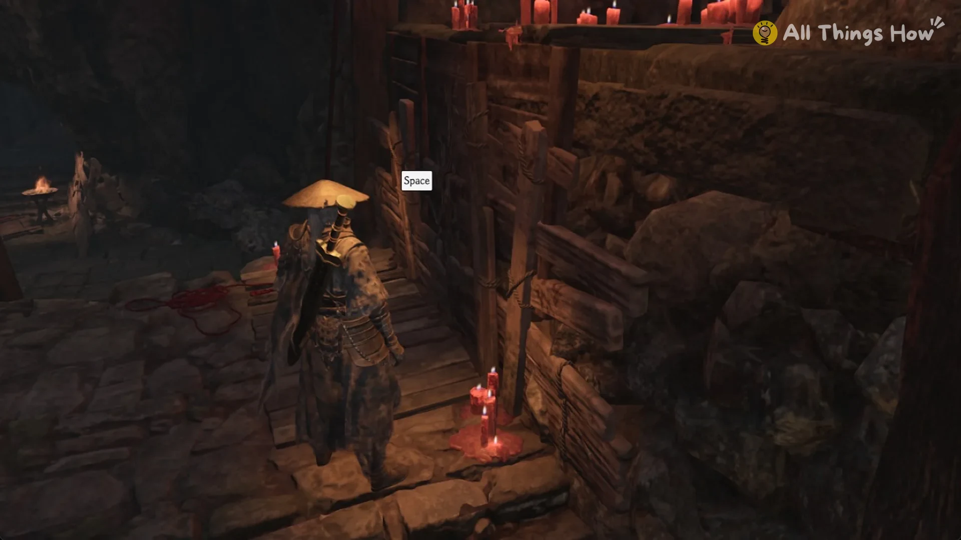 Space prompt at the plank wall with red candles for the wall-run out of the Outer Gate Key cellar, Phantom Blade Zero